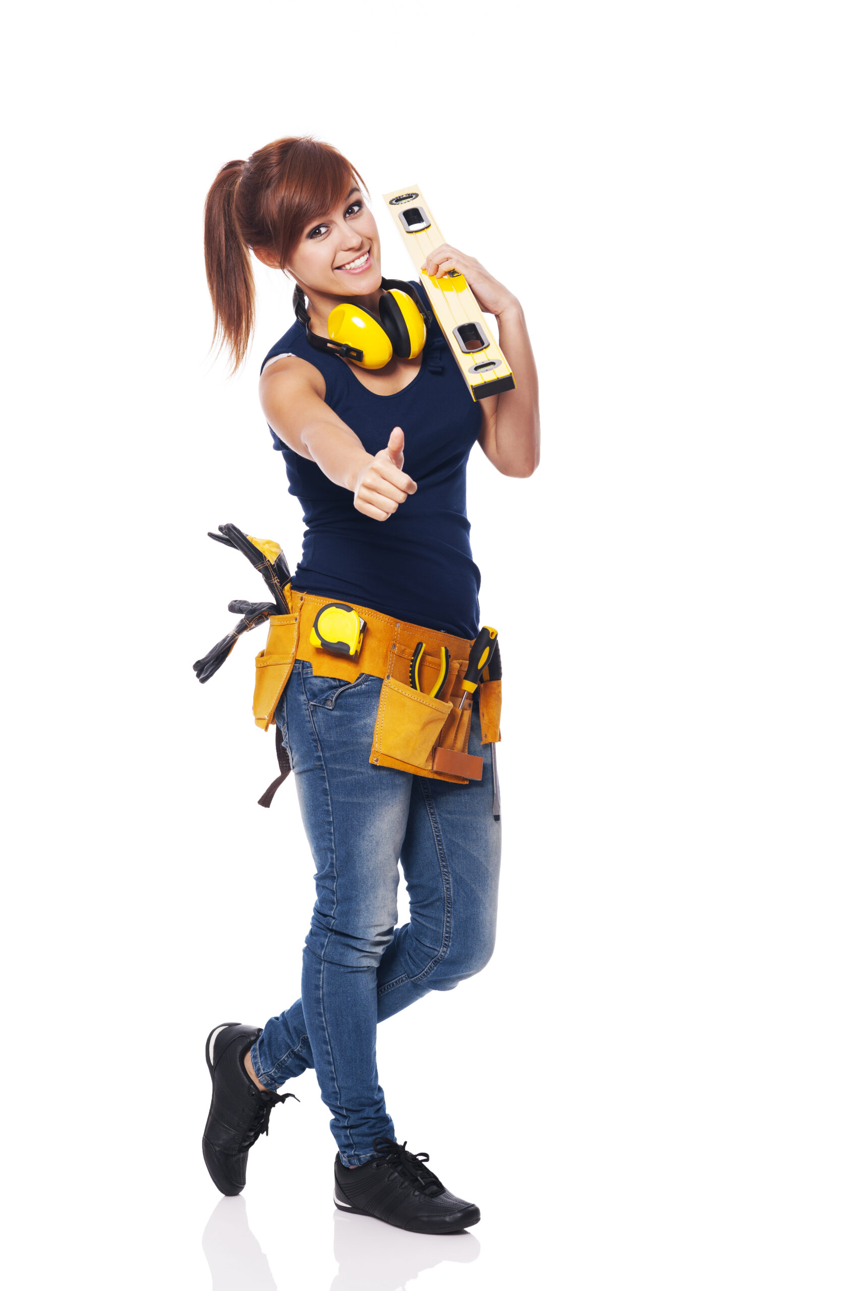 Young female construction worker showing OK sign